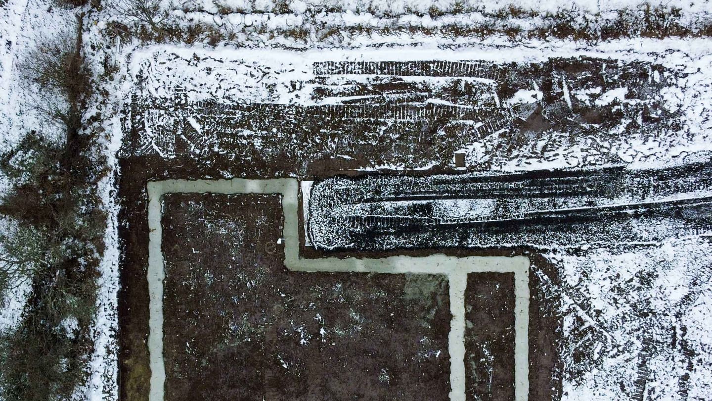 Vue aérienne d’un site photographié au drone pour inspection.
